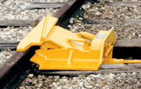 4114-10-L Retractable Derails 
Left Throw One-Way Retractable Derail
For freight cars and locomotives. Derail is supplied with high-rise operating stand, connecting rod and blue derail sign.  Weight 460 lbs.